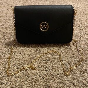 Elegant Black Crossbody Bag with Gold Chain
